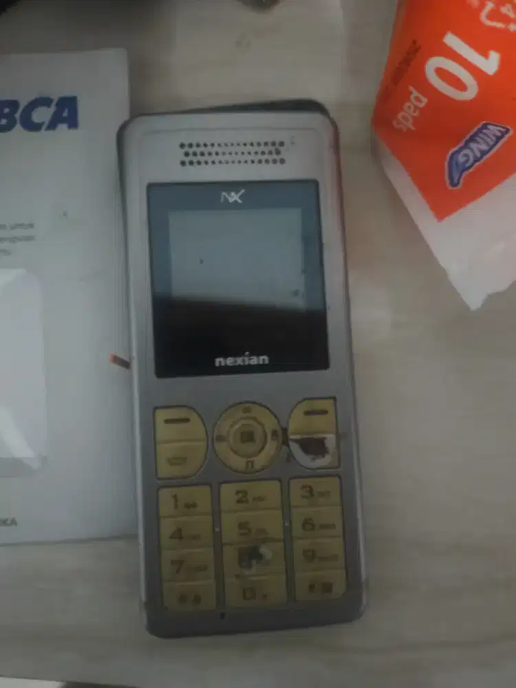 Hp merek Nexian silver black