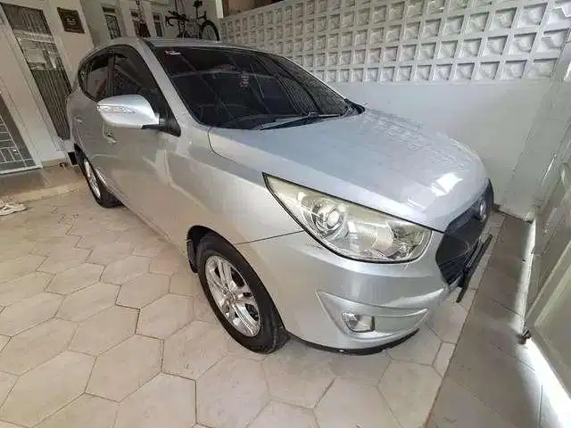 DP MURAH Hyundai Tucson 2.0 Bensin-AT 2013 Hitam CKLOB