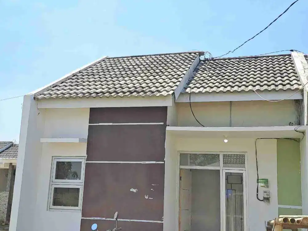 dijual rumah oper kredit/kes dekat kampus unej pojok