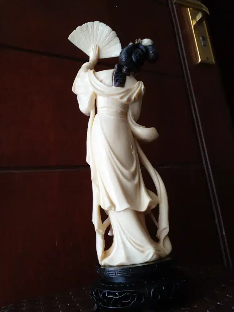 Patung gadis lawas Hong Kong