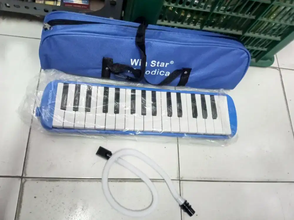 Mainan anak pianika Tiup win star melodica
