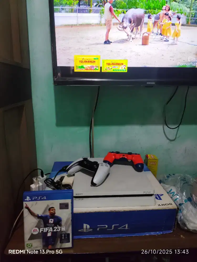 PS 4 Slim kapasitas 500 GB fullset 2 stik dan Kaset FiFA 23