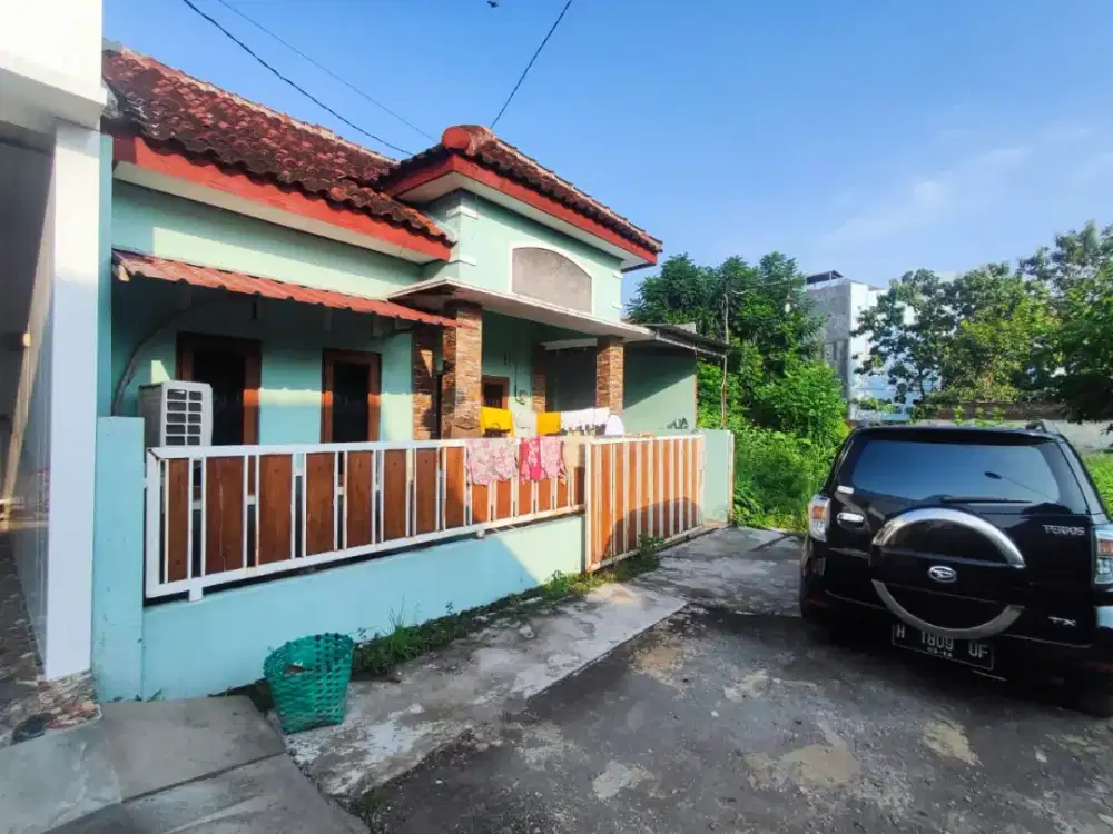 Jual rumah lokasi Utara Alfa MIDI busuan lt 80m hrg 360jt nego