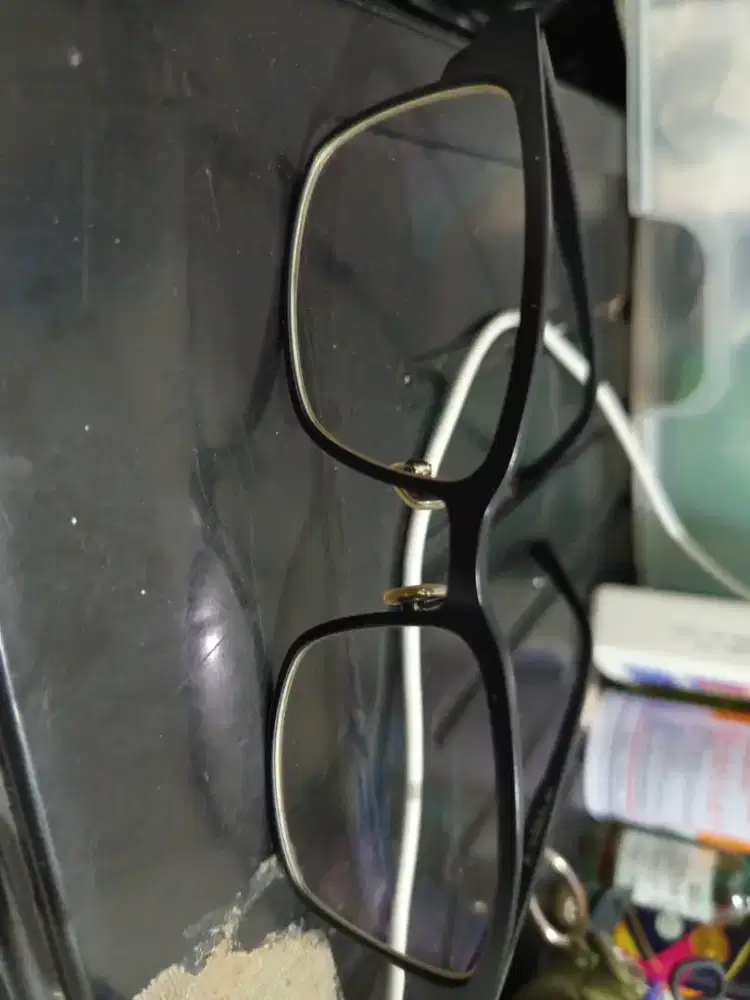 kacamata fotocromix.silinder 0,25 kiri-kanan.