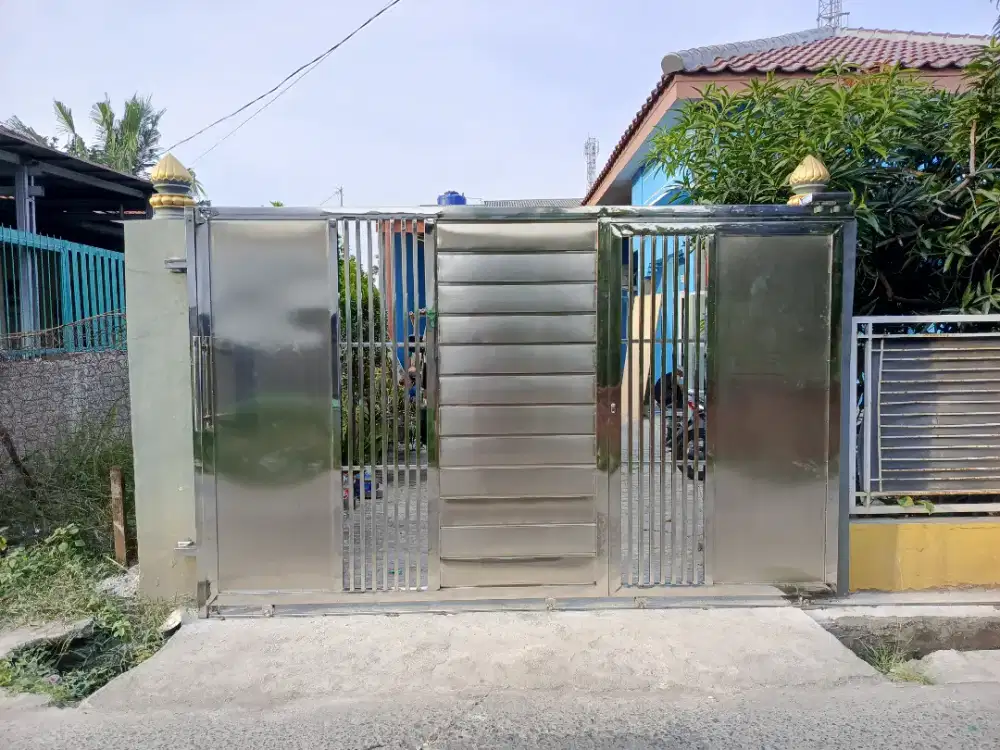 Pintu gerbang dobel sliding stanlis