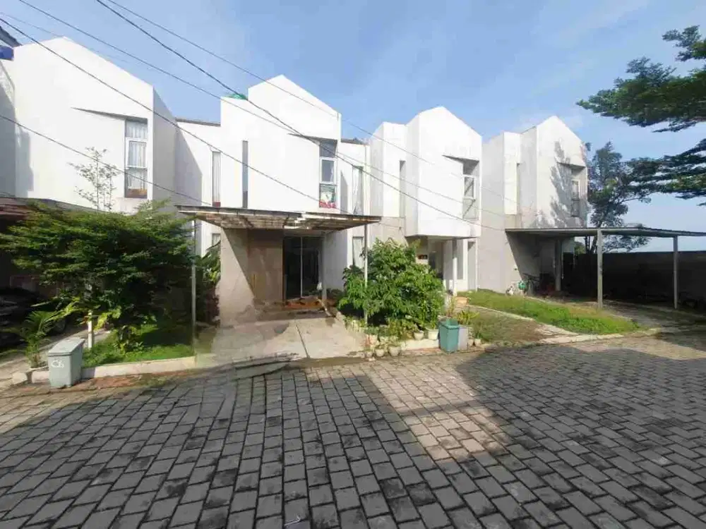 townhouse eksklusif 2 lantai 900 jutaan akses tol dan stasiun