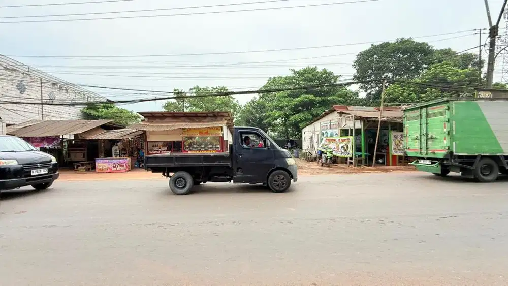 Dijual lahan pinggir jalan raya ada kios 10