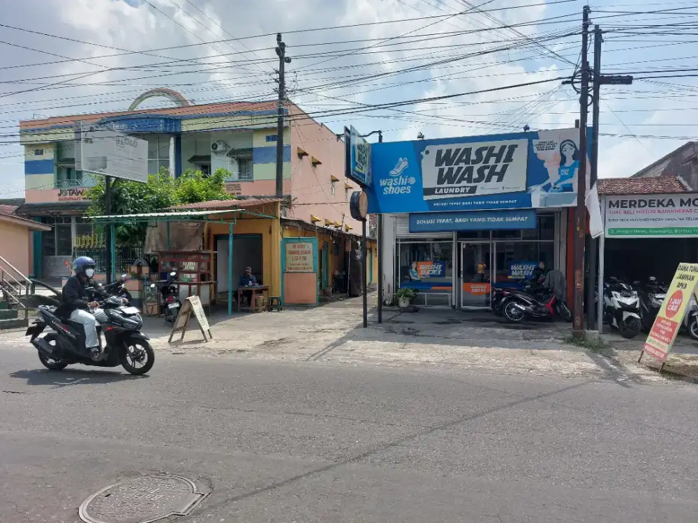 Tanah bangunan pinggir Jalan Raya 946m 2 muka