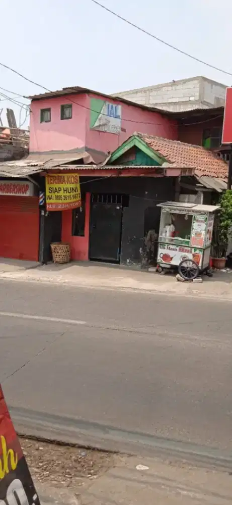 Rumah pinggir jalan raya