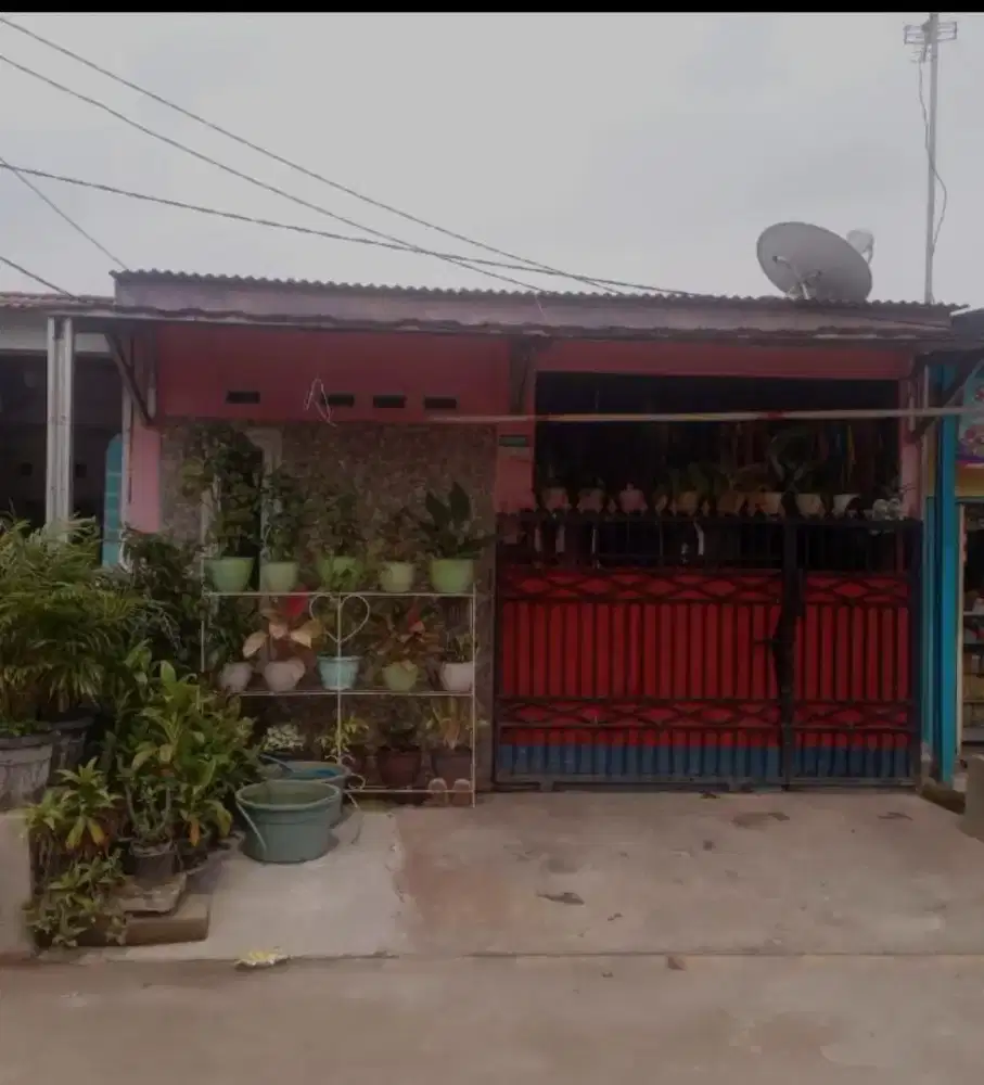 Over kredit rumah posisi di jl utama