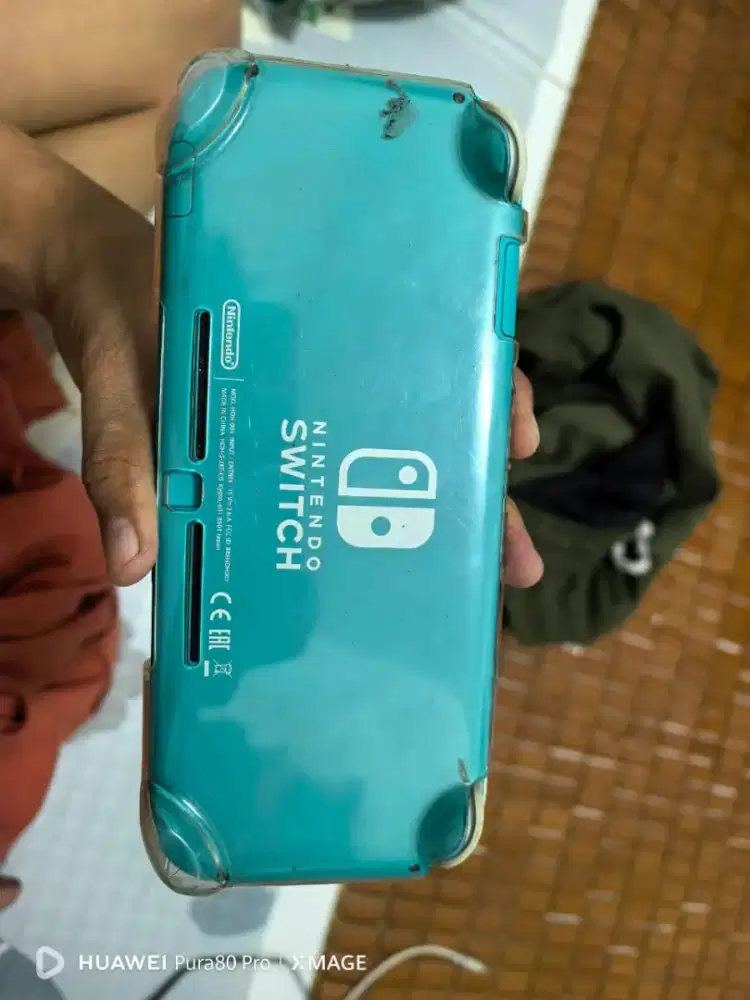 Jual switch lite termasuk memory 128gb suda ada fc 26 harga net ya