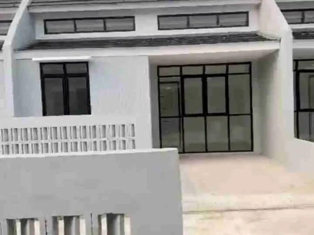 over kredit rumah pinggir jalan utama