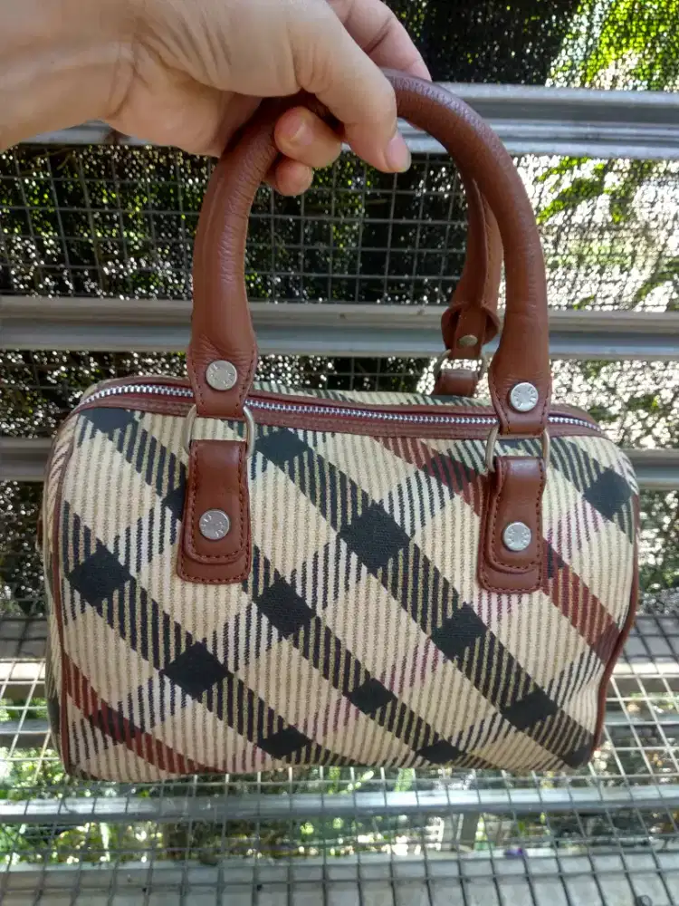 Hand bang Daks kulit asli no Oren dan ijo