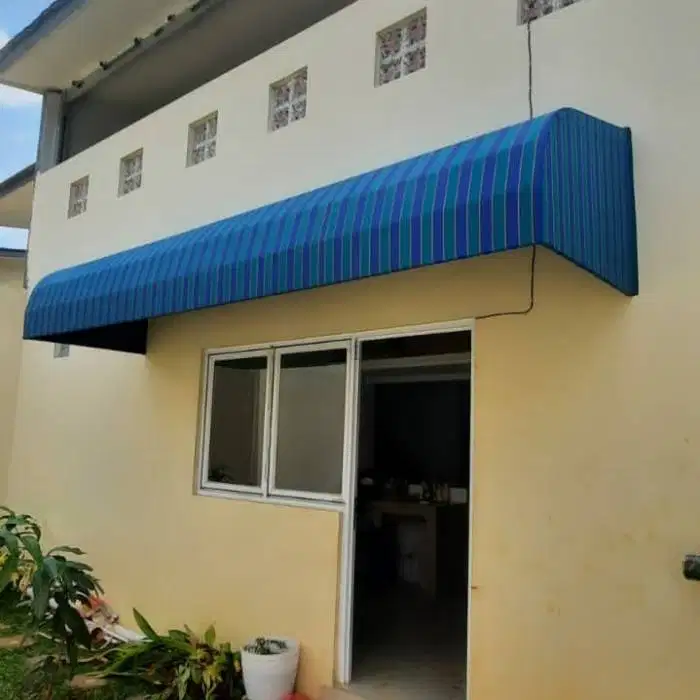 kanopi kain awning warna biru elegan untuk teras rumah