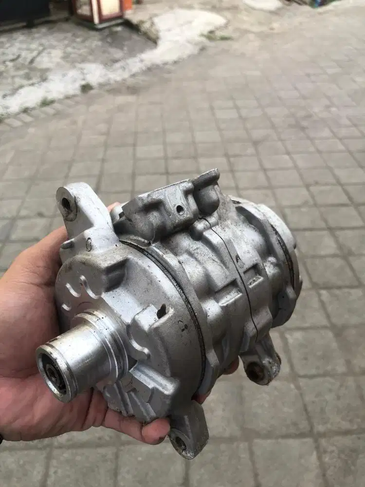 Kompresor dan kondensor Ac Xenia 1000cc tahun 2005