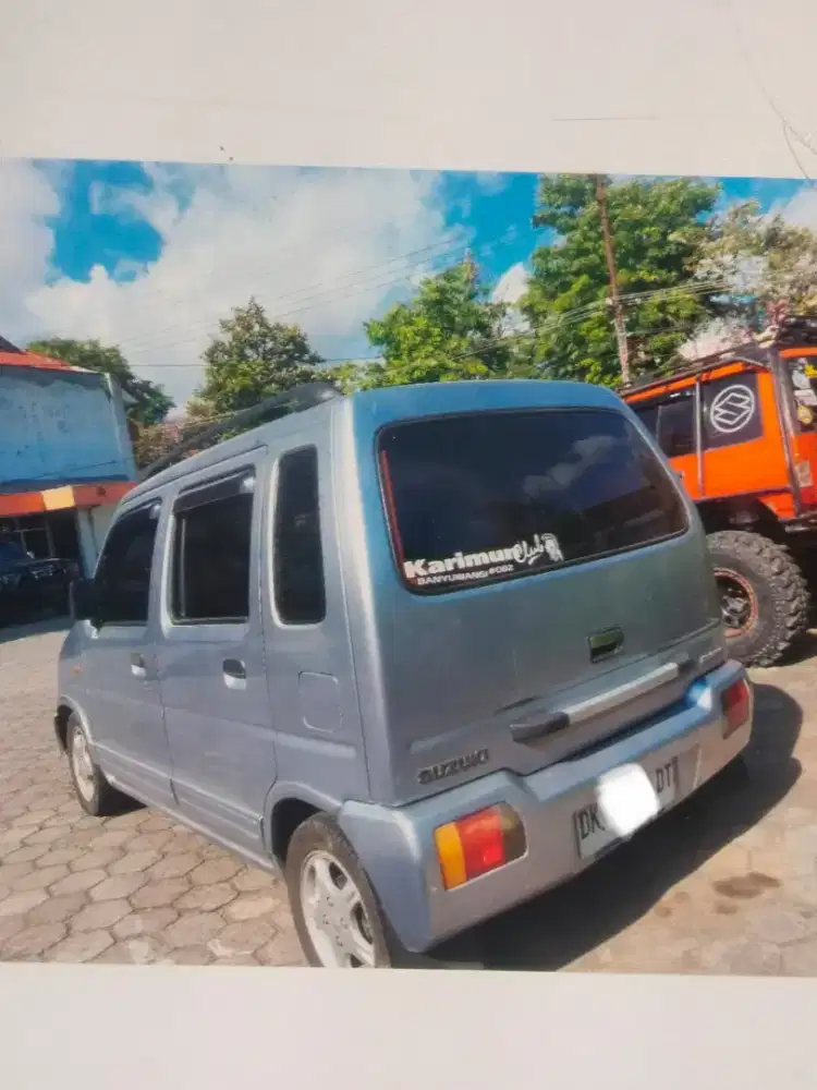 Jual cepat Mobil Zusuki karimun warna Silver THN 2003 siap pakai.