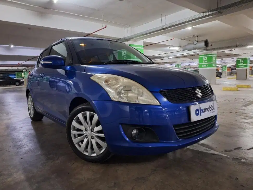 LOW DP Suzuki Swift 1.4 GX Bensin-MT 2012 TMR