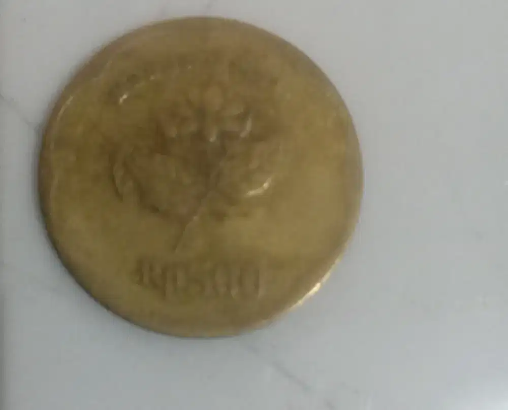 uang koin motif melati