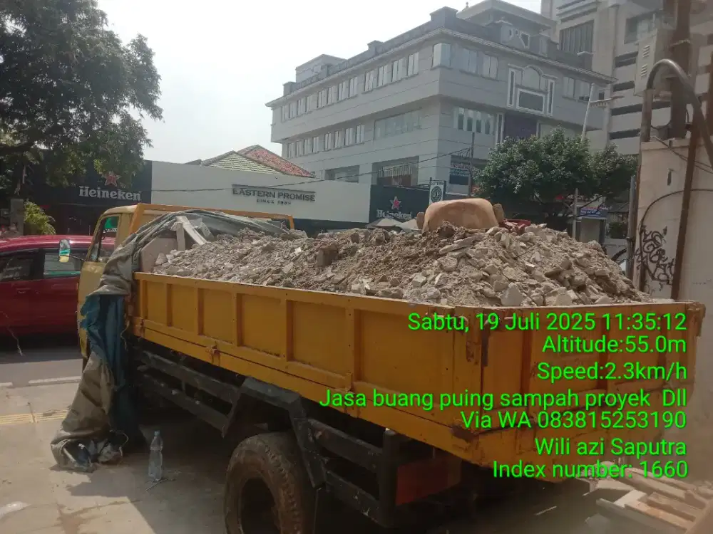 Tukang buang puing sampah dll