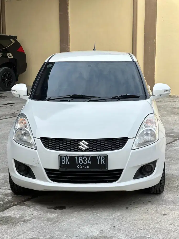 Mobil Swift GX 2014