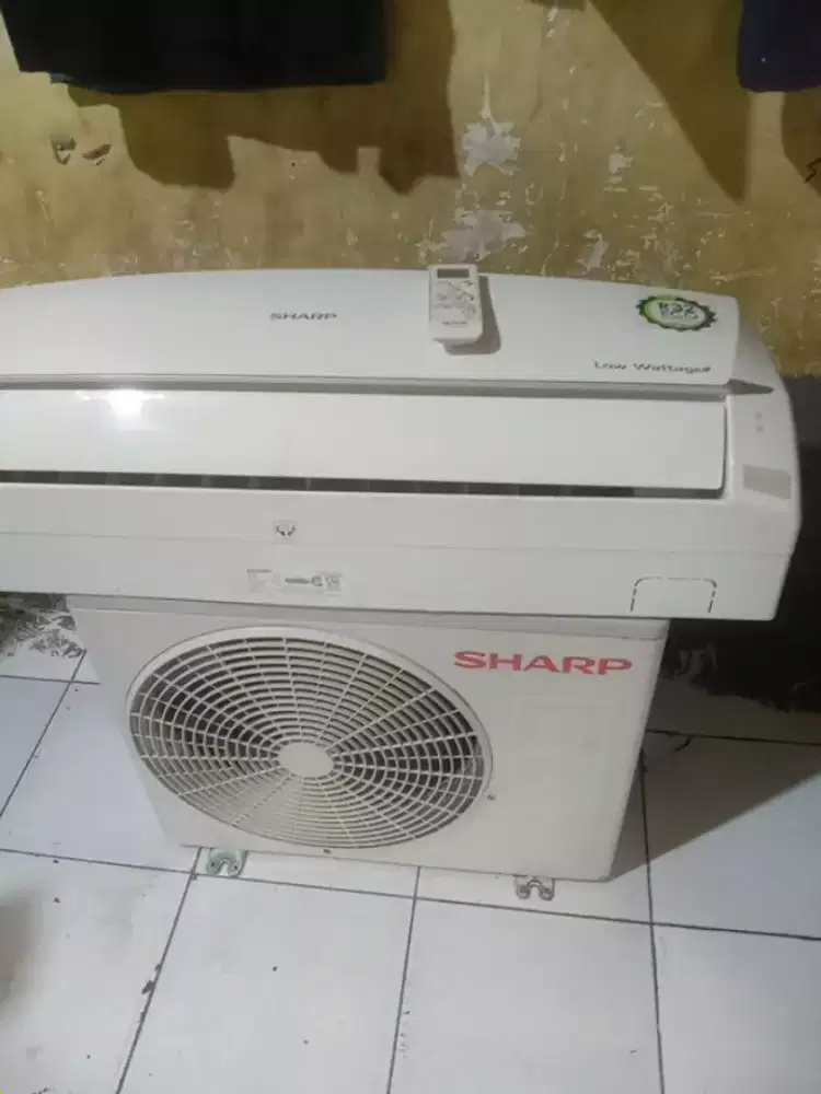 Ac sharp 0,5pk watt kecil +pasang