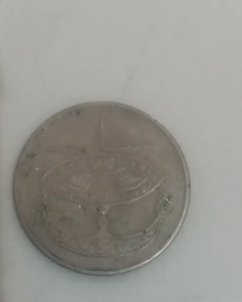 uang koin motif koang