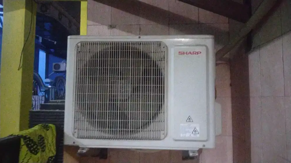 ac merk sharp 1 pk bekas