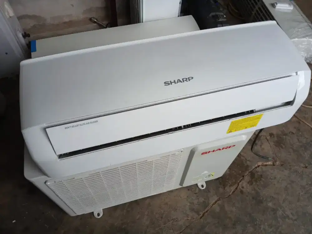 ac sharp ½pk low watt second ori dingin bergaransi
