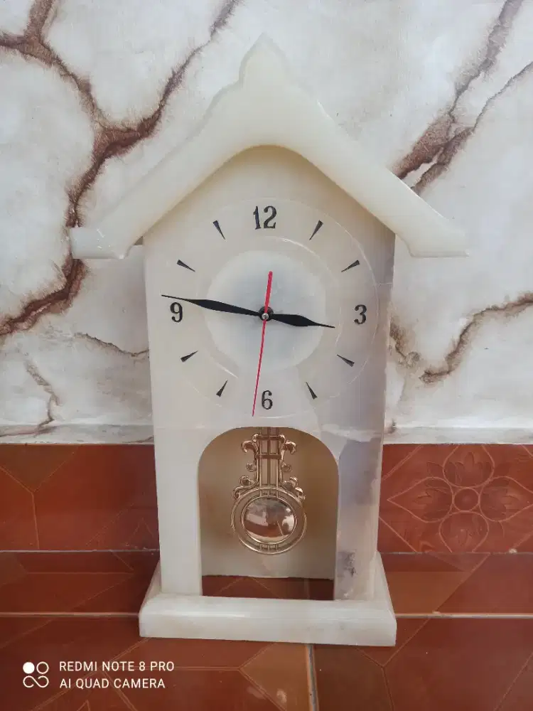 Kerajinan jam batu onik