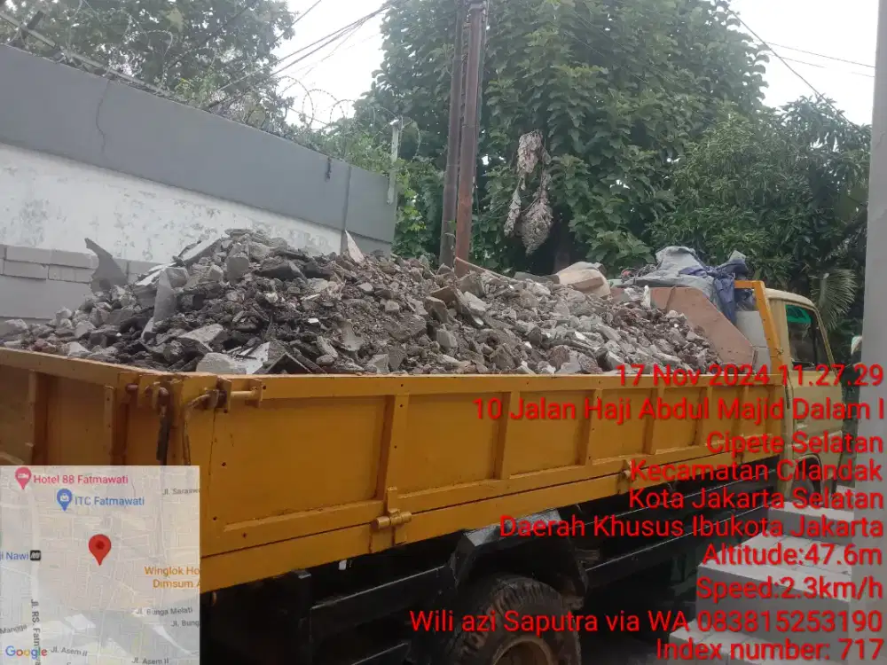 Tukang buang puing sampah dll