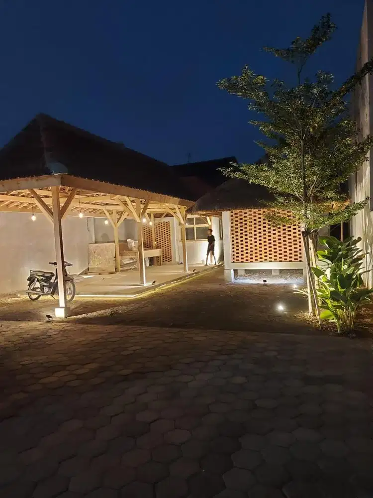 dijual tanah + bangunan pinggir jalan