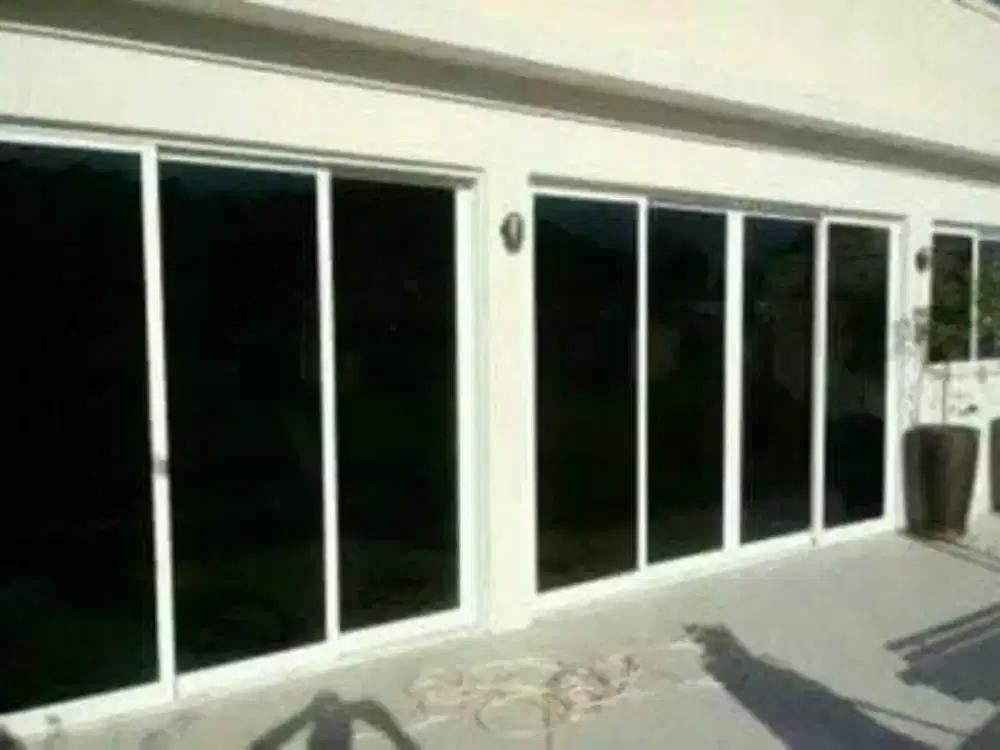 Jasa pasang kaca film gedung - kaca film riben hitam