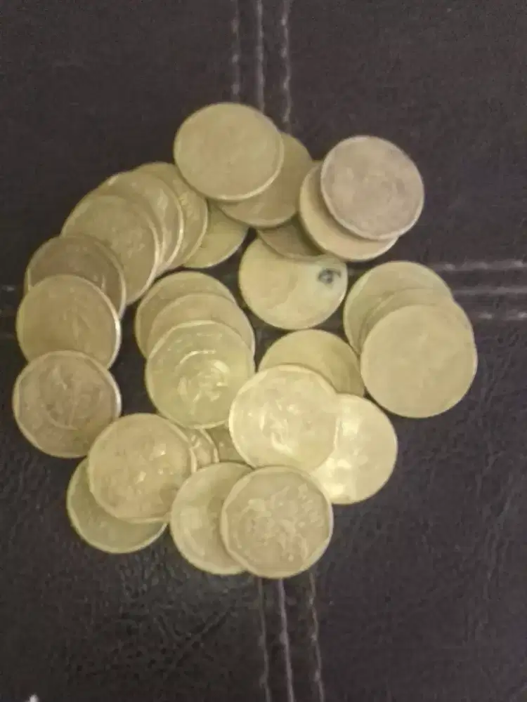 Pecahan Rp 100 karapan sapi