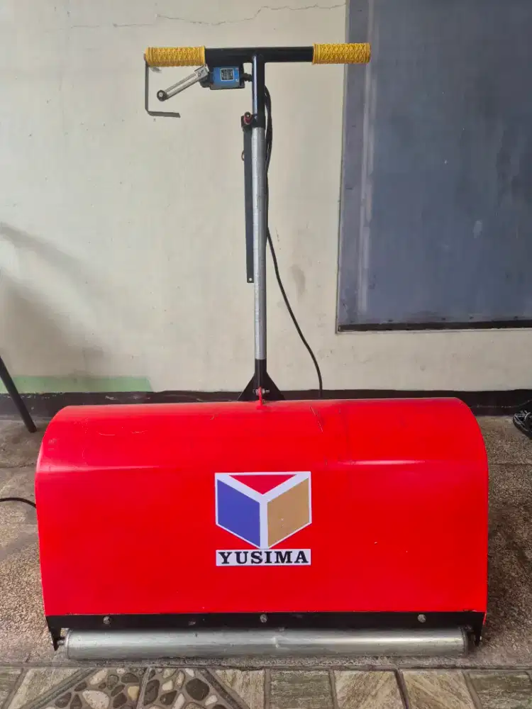 Mesin Perontok Debu Karpet