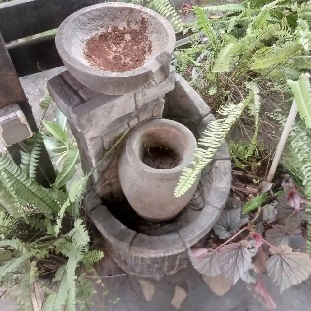 Pancuran air batu sintetis