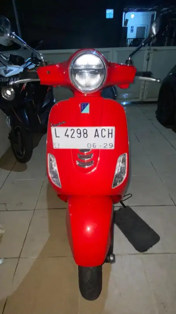 Vespa type Lx 125 i get Merah