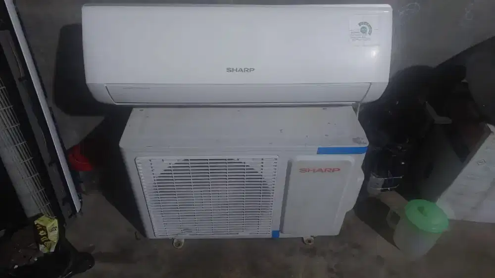 Ac sharp 1/2pk dijamin dingin bergaransi