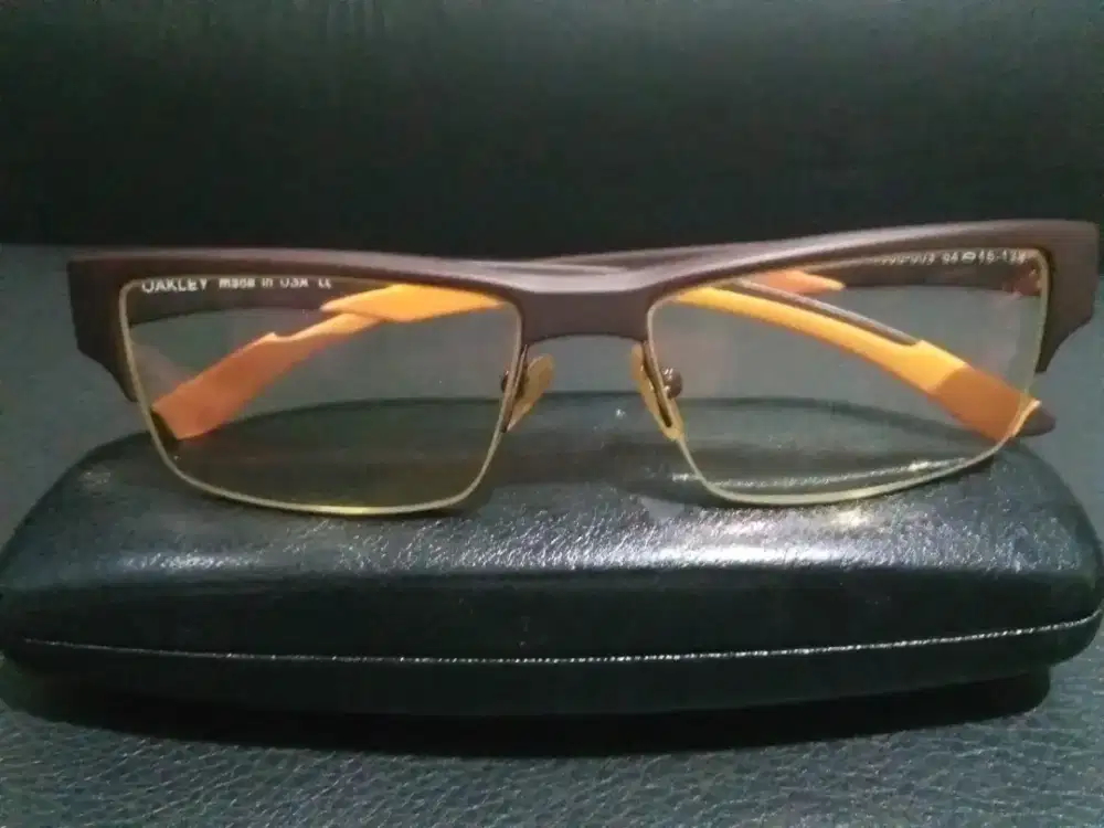 Kacamata Oakley  frame orange brown lens baca jalan..
