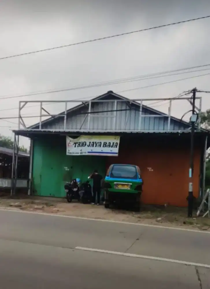 Tanah & Bangunan pinggir jalan