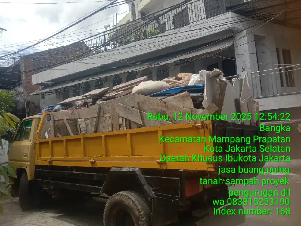 Tukang buang puing sampah dll