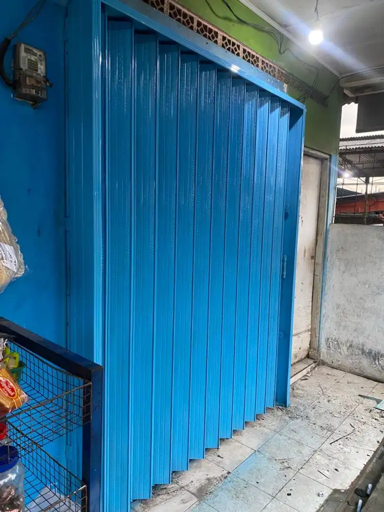 Tukang service rolling door terdekat bergaransi