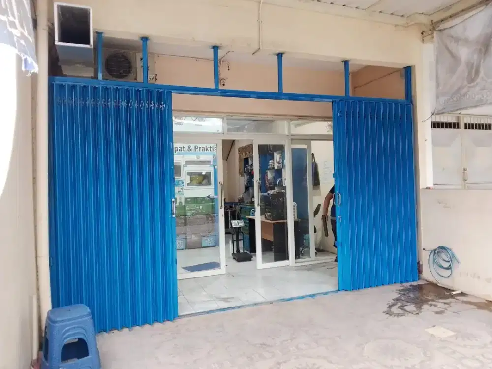 Mengerjakan pintu harmonika