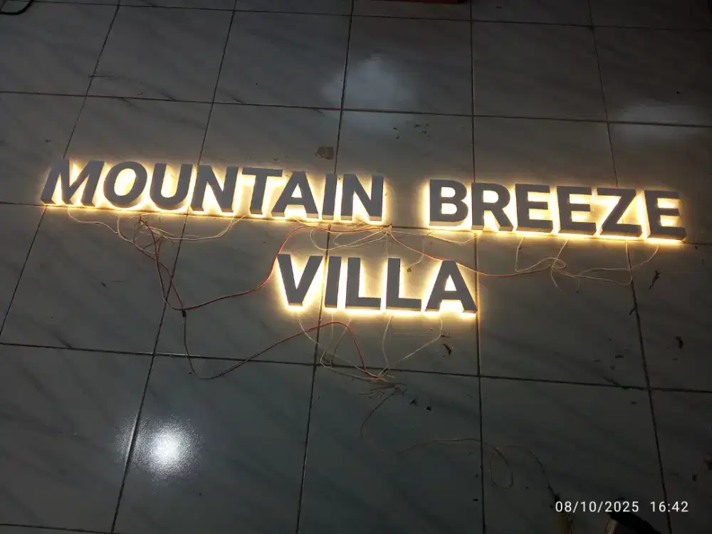 Huruf timbul galvanis  nyala blakang