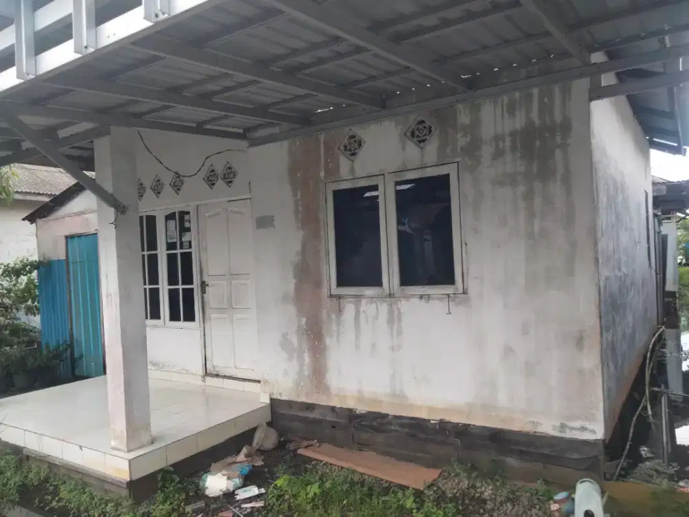 Dijual/sanda rumah handil bakti