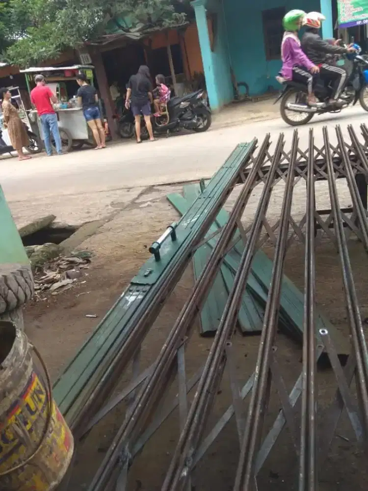 Tukang perbaikan rolling door folding gate murah