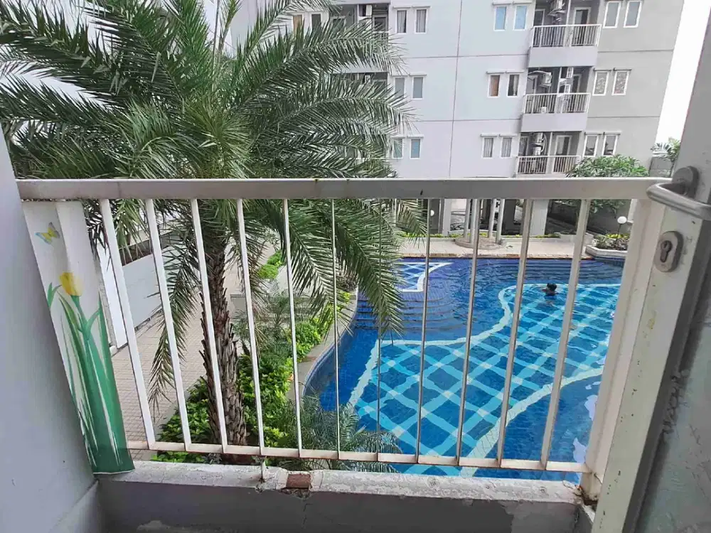 Disewakan Apartemen Puncak Dharmahusada. 2 BR. Gratis Furnished untuk Penyewa.