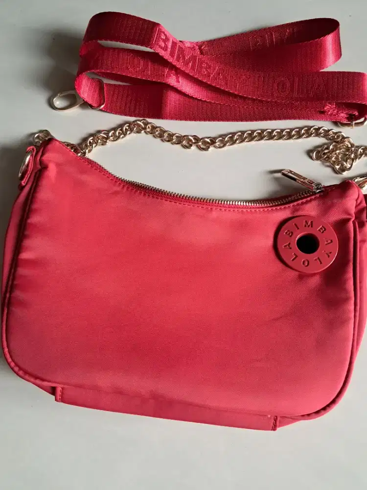 Tas slempang merah