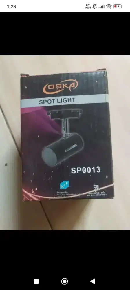 kap lampu sorot Oska
