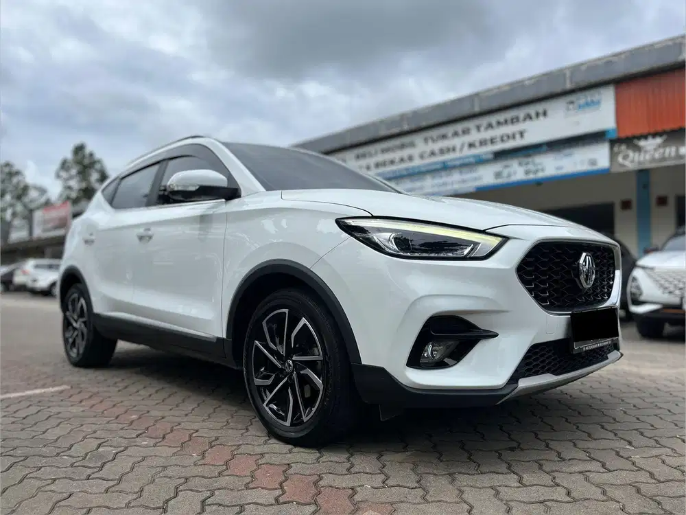 DP 25JT // ZS MAGNIFY 1.5 AT