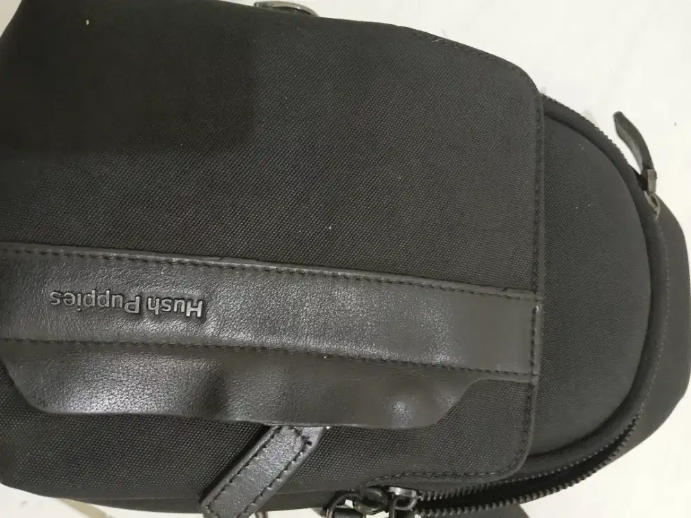 tas slempang hush puppies ori